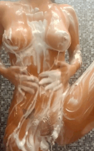 Horny Venezuelan college girl in the shower waiting for you to soap her juicy pussy