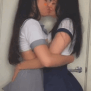 Kiss of two very horny lesbian schoolgirls in the school bathroom